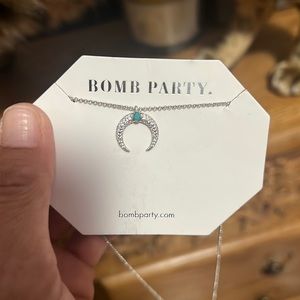 The bejeweled horn necklace